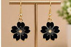 Black flower earrings with gold accents, elegant women's fashion jewelry
