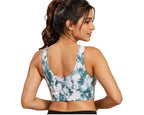 Woman wearing tie-dye sports bra, back view, fitness apparel
